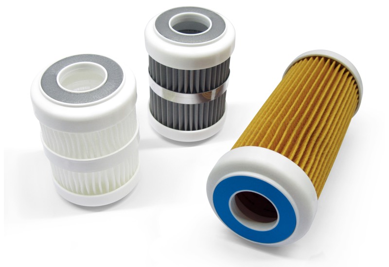 Filtering cartridges with compression sealing